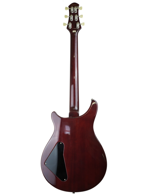 Back view of the Belman Double Cut Grand, highlighting its glossy mahogany finish and ergonomic neck design.