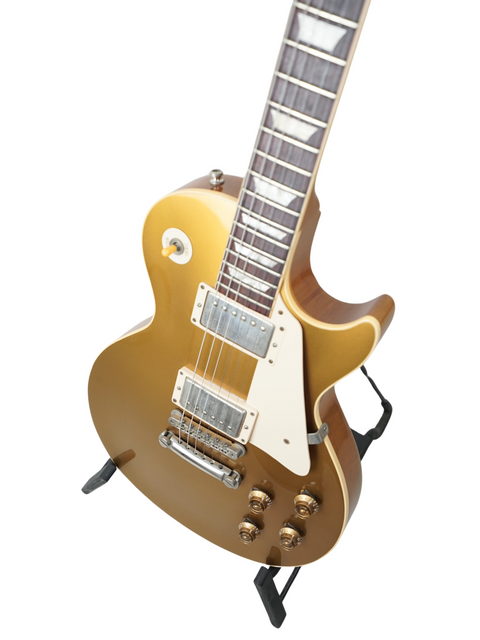 Beautiful 2003 Gibson Les Paul Custom Goldtop guitar, highlighting its vintage appeal and craftsmanship from the Custom Shop.
