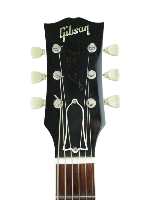 Beautiful Gibson Les Paul Custom '59 Goldtop, a 2003 reissue from the Gibson Custom Shop, radiating classic rock vibes.