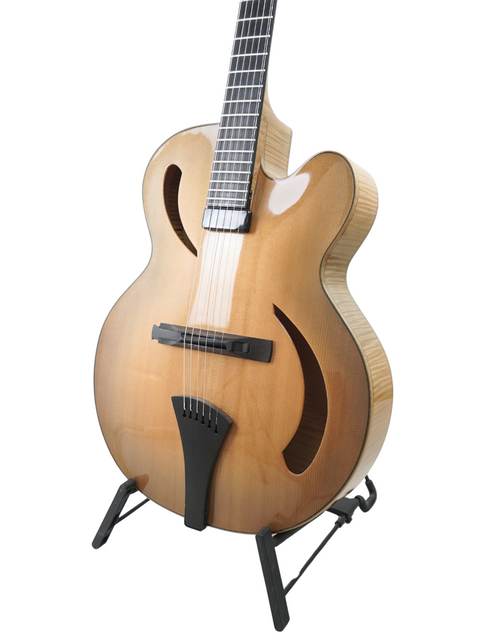 Beautiful Hancock Phantom Custom Archtop guitar with a stand, a must-have for any music lover looking to elevate their sound.