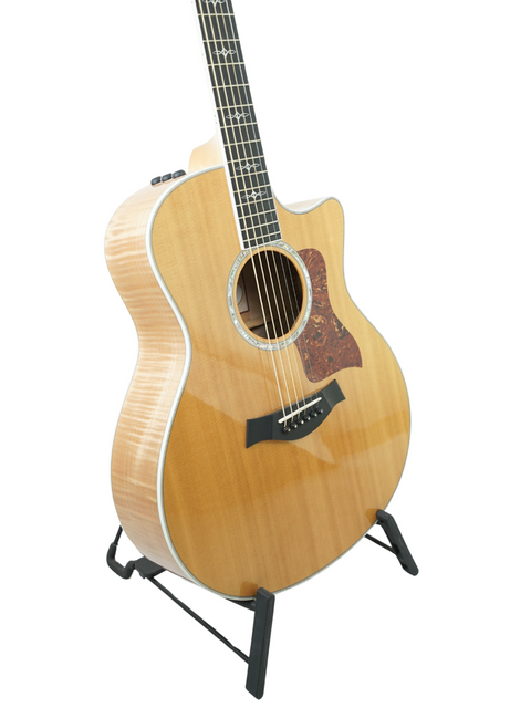 Beautiful Taylor 616ce grand acoustic guitar from 2011, crafted in the USA, perfect for musicians seeking quality and style.