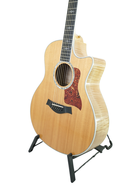 Beautiful Taylor 616ce grand acoustic guitar, made in the USA in 2011, known for its rich sound and exquisite craftsmanship.