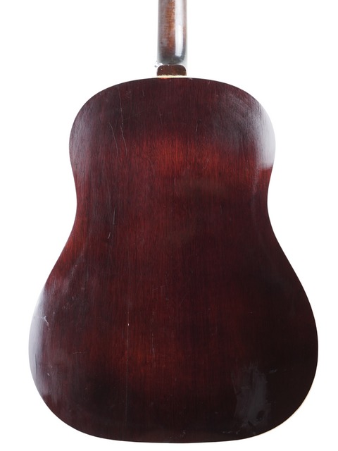 Beautifully crafted 1951 Gibson J-45 acoustic guitar, a timeless piece for collectors and musicians alike, rich in history.
