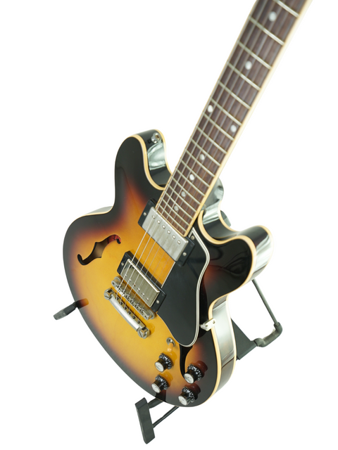 Black-bodied Gibson ES-339 guitar with a vibrant sunburst finish, handcrafted in the USA by the Custom Shop in 2009.