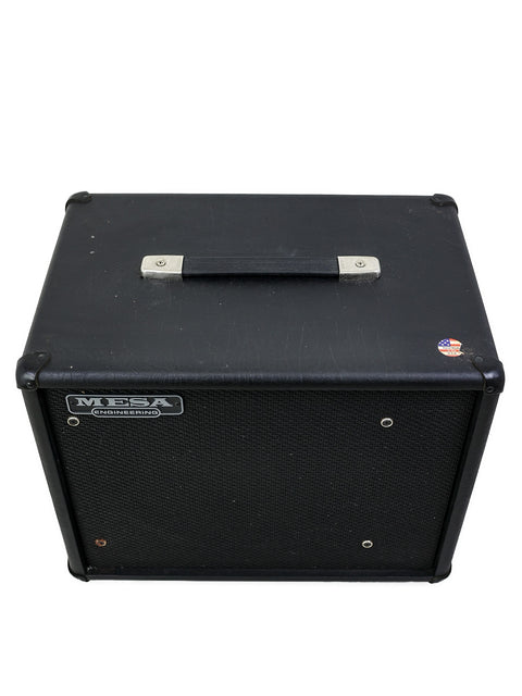 Black amplifier with a metal top cover, showcasing a Mesa Boogie 1x12" speaker box, made in the USA in 2006.