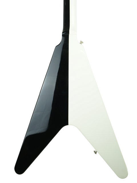Black and white electric guitar body with a sharp, angular design.