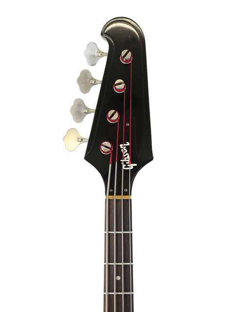 Black bass guitar with red and white accents, showcasing the vintage style of the 1976 Gibson Bicentennial Thunderbird IV.
