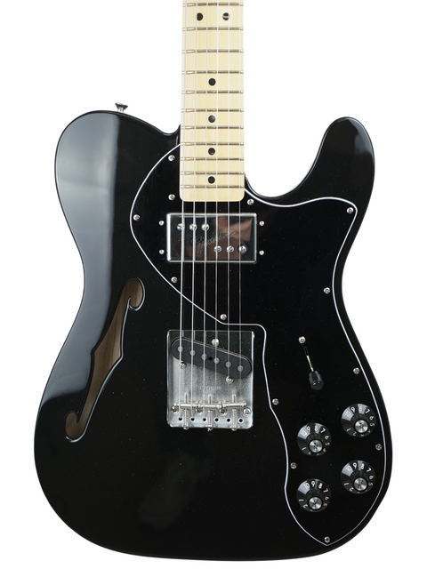 Black electric guitar with single cutaway and white pickguard.