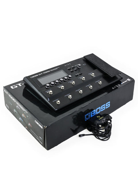 Boss GT-1000 Multi-Effects Pedal with original packaging and power supply, ready for studio or stage use.