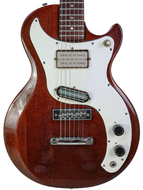 Brown 1975 Gibson Marauder electric guitar featuring a white pickguard, exemplifying vintage American guitar artistry.
