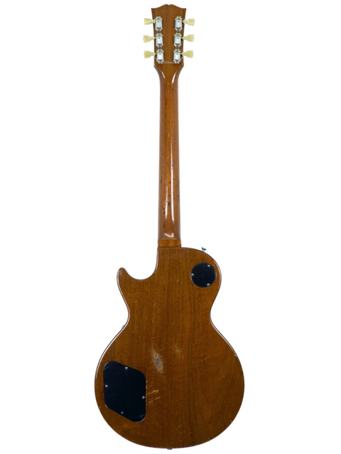 Brown wooden body and neck of a vintage 1968 Gibson Les Paul Standard Goldtop guitar, highlighting its iconic craftsmanship.