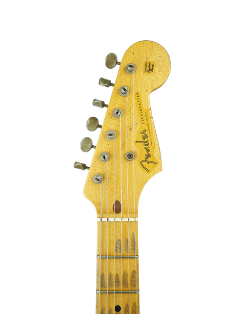 Celebrating 60 years, this Fender Custom Shop '54 Stratocaster Relic showcases a stunning wooden headstock design.
