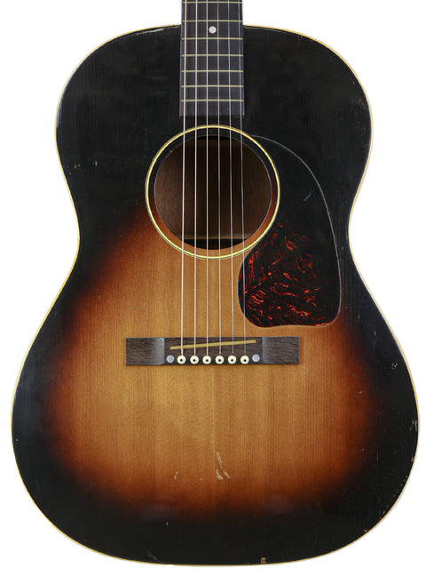 Classic 1951 Gibson J-45 sunburst guitar, featuring a beautiful finish and iconic design elements.
