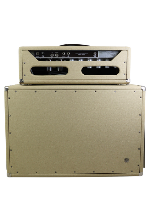 Classic 1961 Bandmaster amp cabinet in beige, featuring a minimalist white backdrop that emphasizes its vintage appeal.