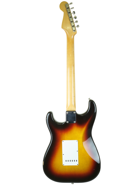 Classic 1961 Fender Stratocaster in sunburst finish, highlighting its vintage charm and iconic style.
