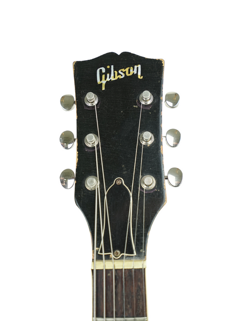 Classic 1961 Gibson Les Paul Standard, featuring a sunburst finish and renowned for its exceptional sound quality.