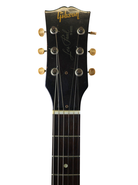 Classic 1961 Gibson Les Paul Standard in TV Yellow, representing the iconic design of vintage American guitars.