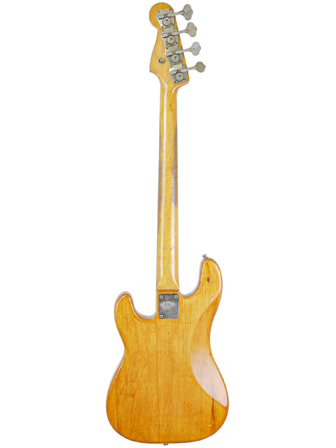 Classic 1963 Fender L-Series Precision Bass guitar with a rich wooden body, highlighting its vintage charm and quality.