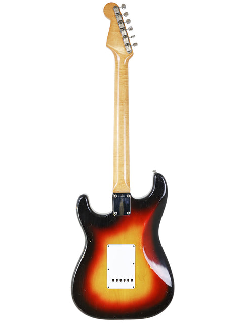 Classic 1963 Fender L-Series Stratocaster featuring a vibrant sunburst finish, perfect for any guitar enthusiast.