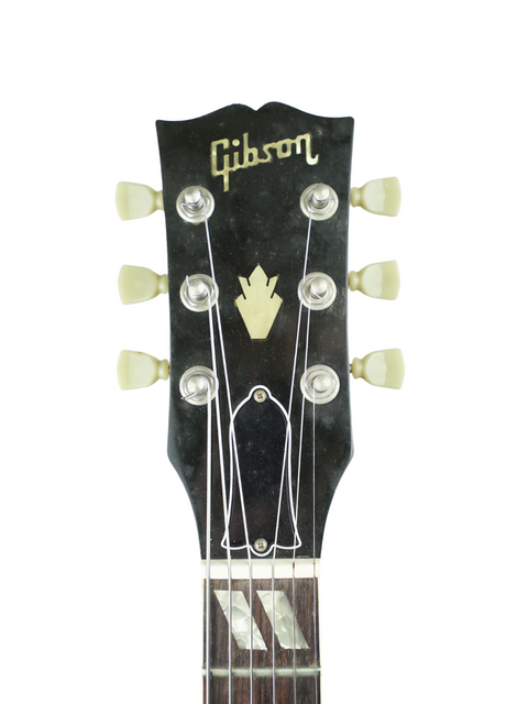 Classic 1964 Gibson Les Paul Custom, featuring elegant curves and a timeless finish, a must-have for vintage guitar lovers.