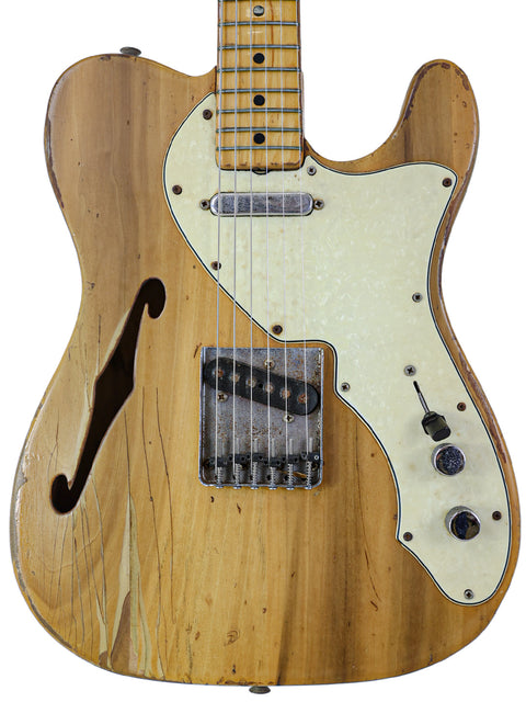 Classic 1971 Fender Telecaster Thinline guitar with a sleek wooden body and neck, embodying vintage charm and quality.
