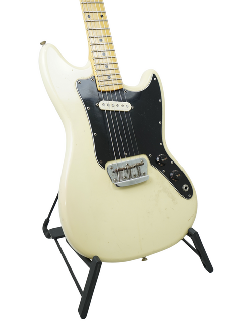 Classic 1978 Fender Musicmaster electric guitar in white, complete with a black pickup, perfect for any music lover.