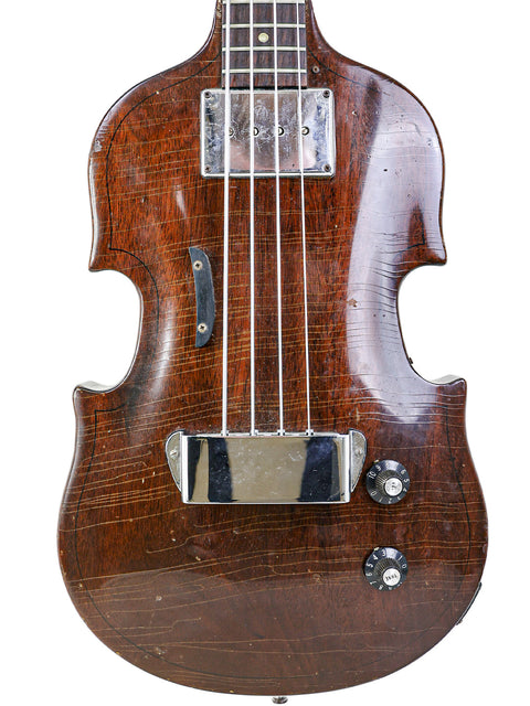 Classic brown Gibson EB-1 guitar from 1969, equipped with a sturdy metal bridge, perfect for music enthusiasts.