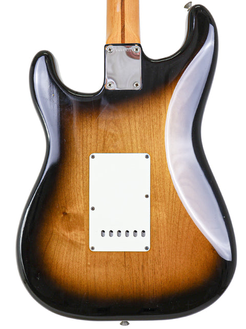 Classic sunburst Fender Custom Shop Stratocaster, highlighting the vintage appeal of the 1982 AVRI '57 design.