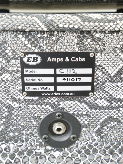Close-up image of a metal box with a label: Soldano Hot Rod 100 Plus Head & Custom EB Cabinet, made in the USA, 2006.