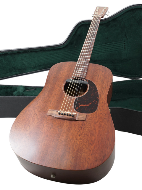 Close-up of a Martin DM-1 acoustic guitar, 2014 model, featuring a beautiful wood grain and elegant craftsmanship.