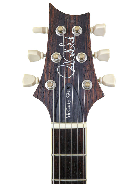Close-up of a PRS McCarty Singlecut 594 headstock displaying "David Lee" name, USA model from 2020.