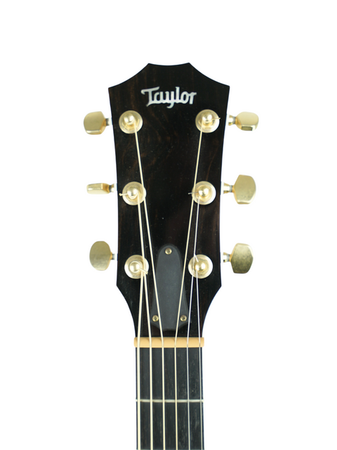 Close-up of a Taylor D-18E acoustic guitar, model 616ce from 2011, highlighting its elegant design and quality finish.