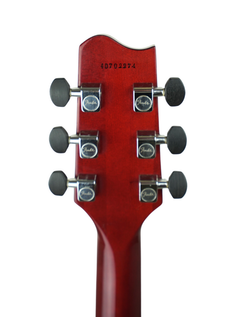 Close-up of a red guitar headstock with four knobs, representing the 1984 Vintage Fender Esprit from Japan.