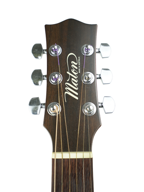 Close-up of an acoustic guitar headstock featuring the name "Mikro," model Maton CW80/6 from Australia, 1991.