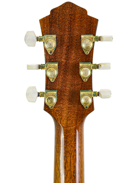 Close-up of an acoustic guitar neck featuring four knobs, showcasing the Matchless Lightning 15 Combo from 1997, USA.