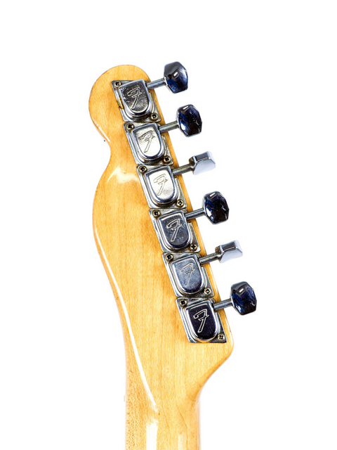 Close-up shot of a 1978 Fender Telecaster Custom guitar neck featuring rosewood and several knobs.
