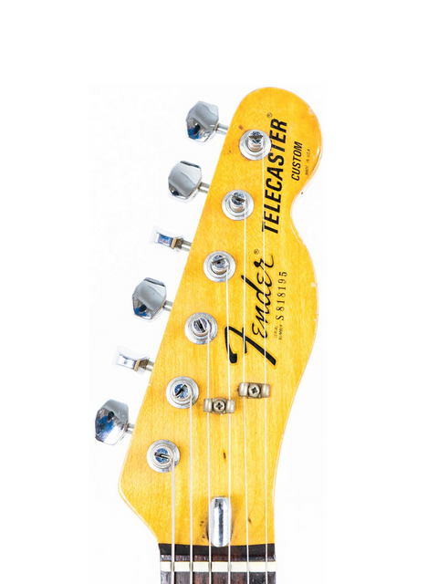 Detailed view of a 1978 Vintage Fender Telecaster Custom headstock, highlighting its iconic shape and rosewood fingerboard.