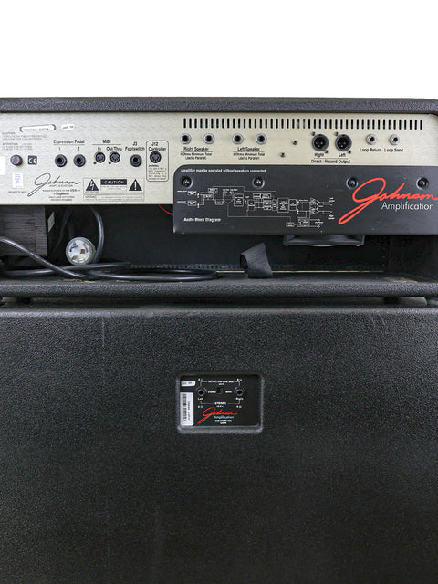 Detailed view of a 1998 Johnson Millennium Stereo 250 guitar amplifier, highlighting its control knobs and sleek design.