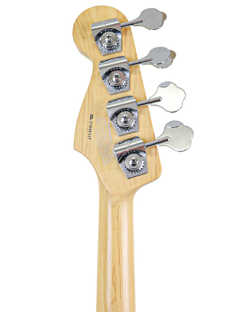Detailed view of a 2005 USA Fender Jazz Bass, highlighting its four strings and craftsmanship.