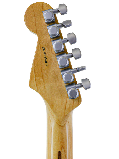 Detailed view of a 2015 Fender Jeff Beck Stratocaster guitar head with four knobs prominently displayed.