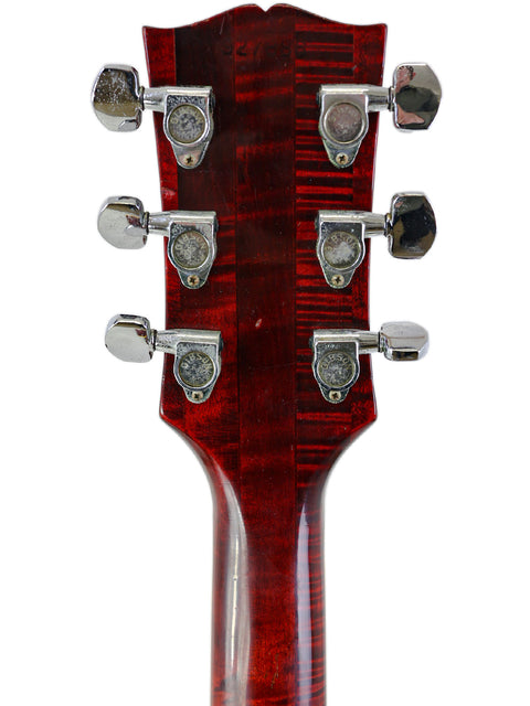Detailed view of the headstock from a 1968 Vintage Gibson Dove electric guitar, highlighting its vintage features.