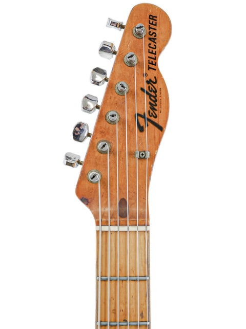 Detailed view of the headstock from a 1971 Vintage Fender Telecaster Thinline, emphasizing its classic features.
