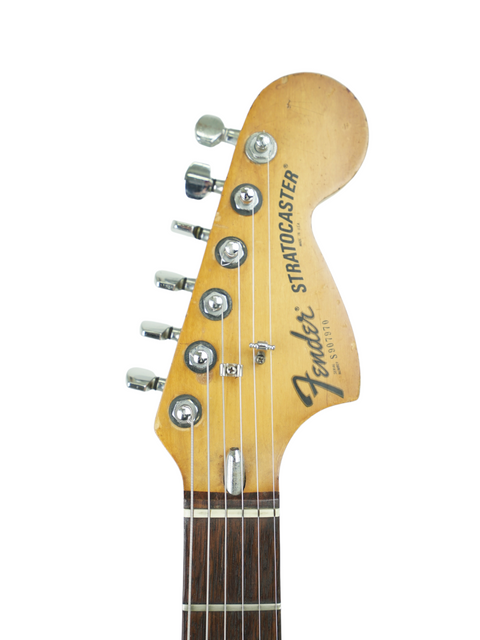 Detailed view of the headstock from a 1979 Fender Stratocaster, reflecting its timeless style and quality.