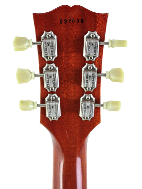 Detailed view of the headstock of a Gibson Les Paul '59 Reissue electric guitar, highlighting its classic features from USA 2009.