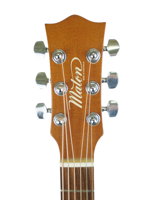  Detailed view of the headstock of a Maton EM300 acoustic guitar, showcasing the word "makar," made in Australia, 1991.