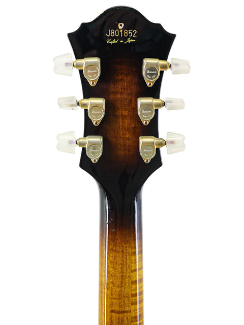 Detailed view of the headstock of an Ibanez JP20 Joe Pass Signature acoustic guitar, made in Japan in 1982, highlighting its craftsmanship.