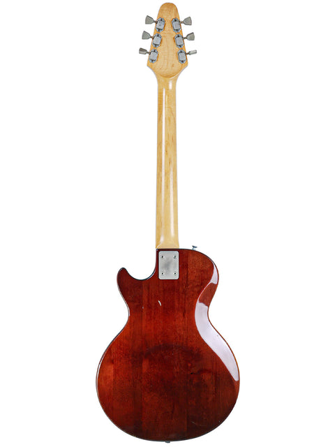 Electric guitar: 1975 Gibson Marauder with a wooden body and neck, representing vintage style and quality craftsmanship.