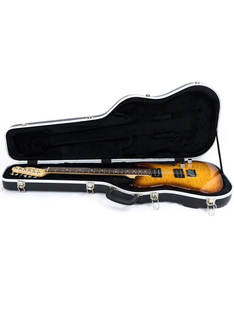 Electric guitar in a black case with white background.