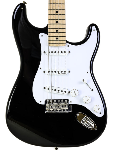 Electric guitar in black with a white pickguard, the Fender Eric Clapton "Blackie" Stratocaster, USA 2022 model.
