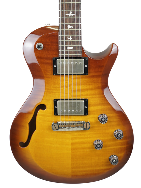 Electric guitar with a sunburst finish, PRS S2 Singlecut Semi-Hollow, USA 2018 model, showcasing its vibrant colors.